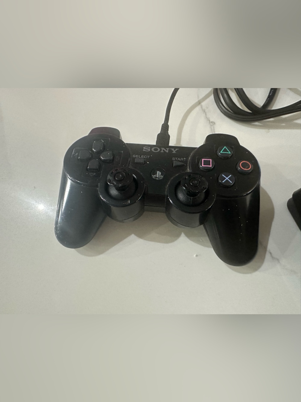 Sony Black PS3 Slim Console with Wired DualShock Controller and Game Discs - Picture 6 of 11